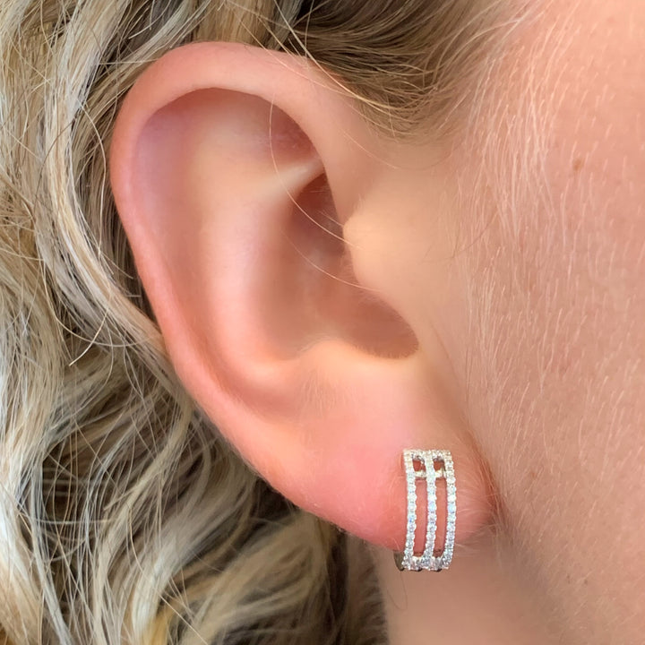 14k White Gold Diamond Huggie Earrings 0.24 cttw