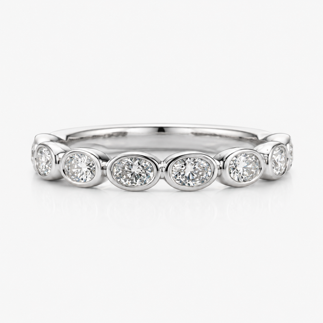14k White Gold Bezel Set 0.60ctw Oval Diamond Wedding Band